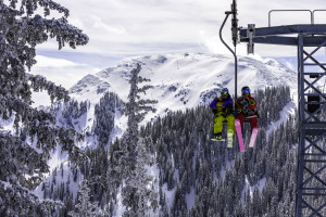 Josh Daiek, Andrea Krejci skiing at Taos